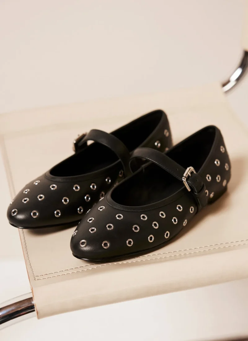 black leather eyelet pumps