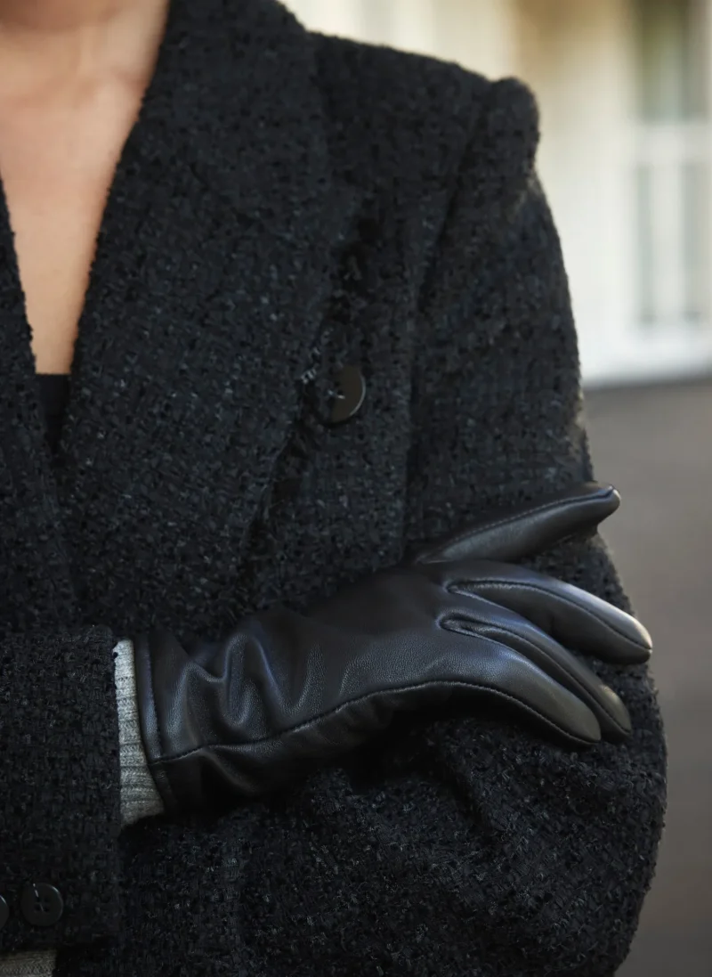 black leather gloves with knit trim