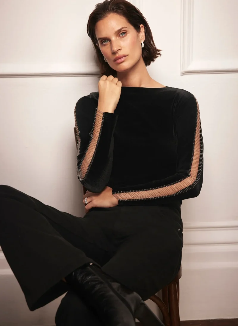 elegant black velvet top with sleek sleeve detail