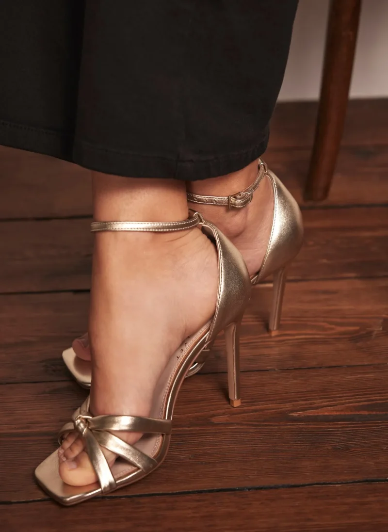 elegant gold high heel sandals with strappy design