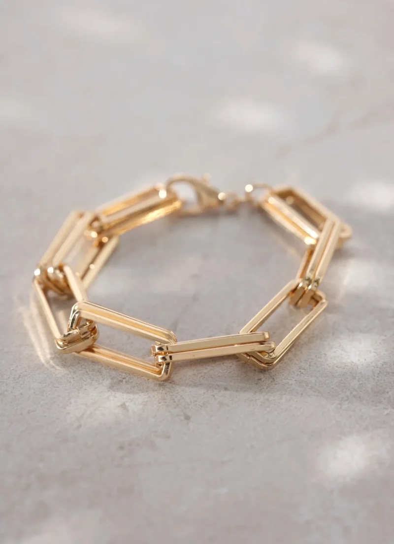 gold square link bracelet in tone