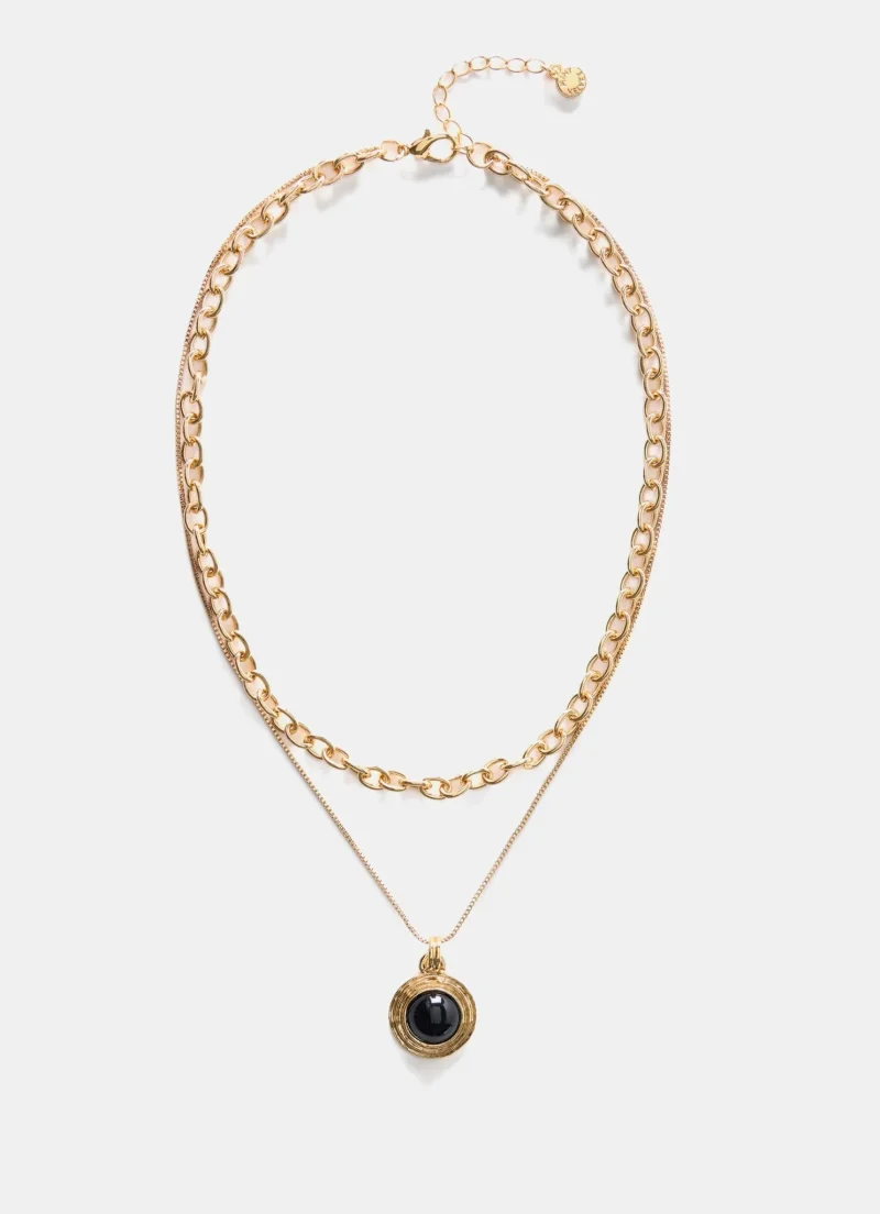 gold tone layered necklace with stone accents