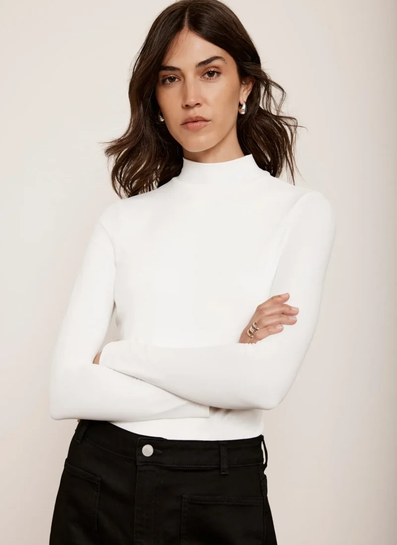 layered white long sleeve top