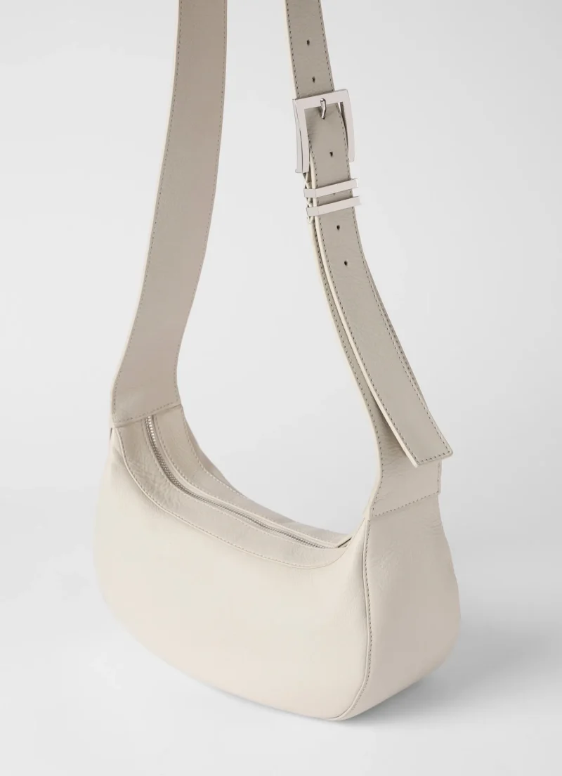 leather sling bag cream edition