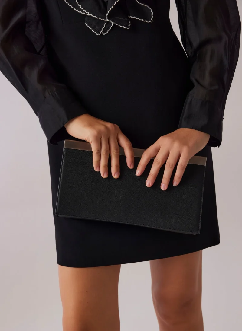 minimalist black leather clutch bag