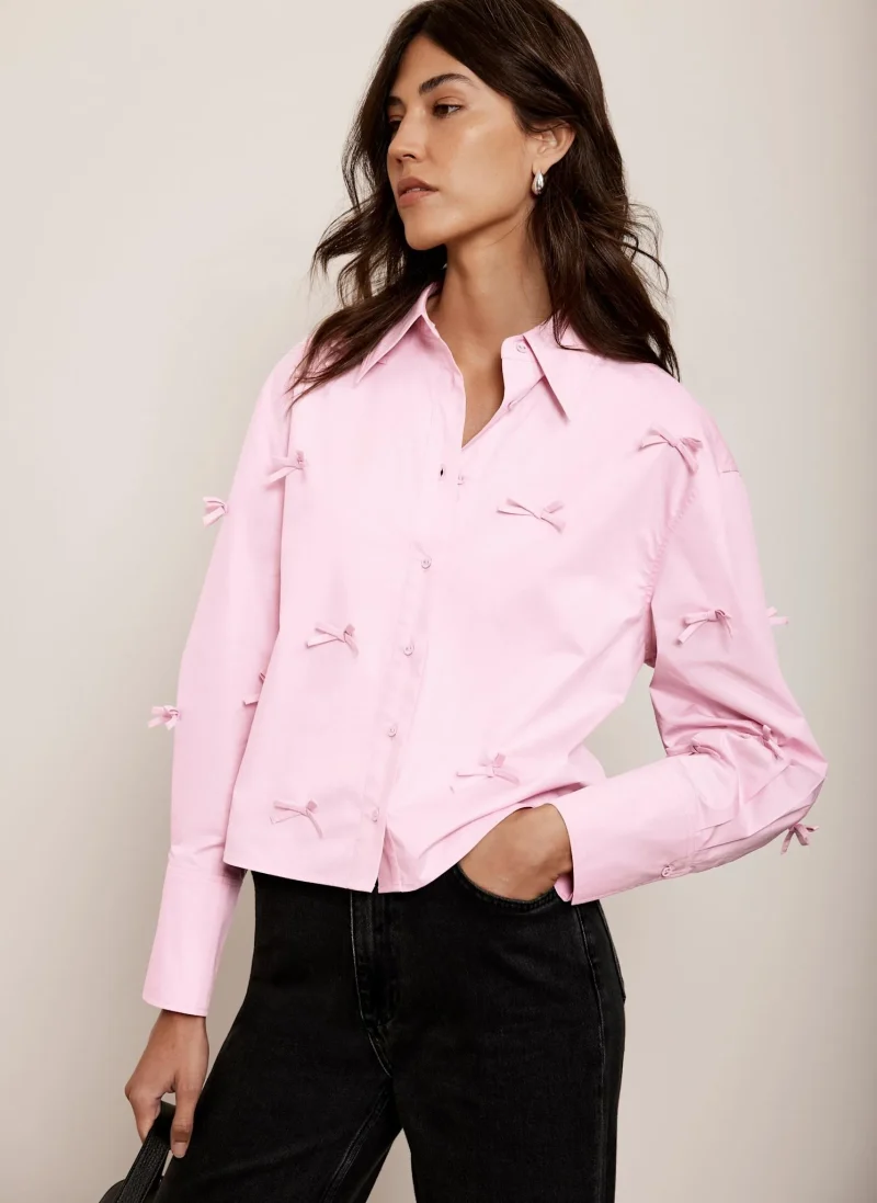 pink cropped shirt with bow trim