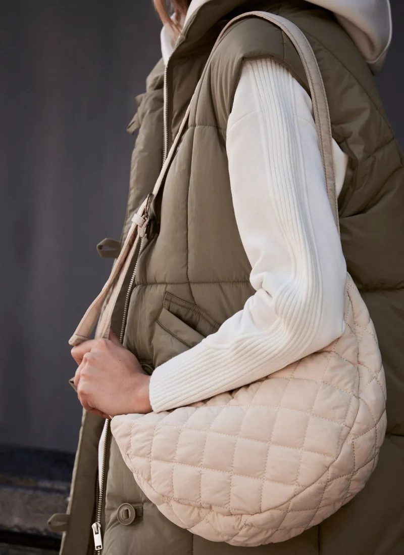 quilted cream sling bag