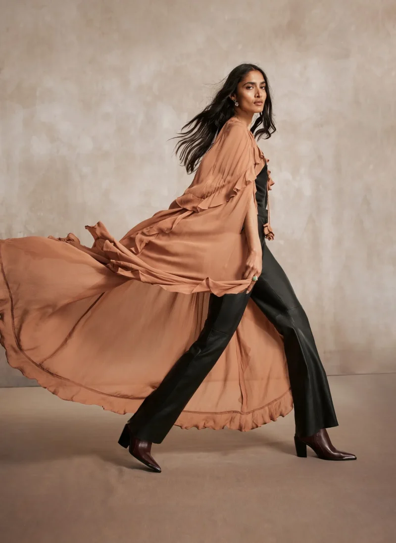 rustic ruffled maxi cape with side slits