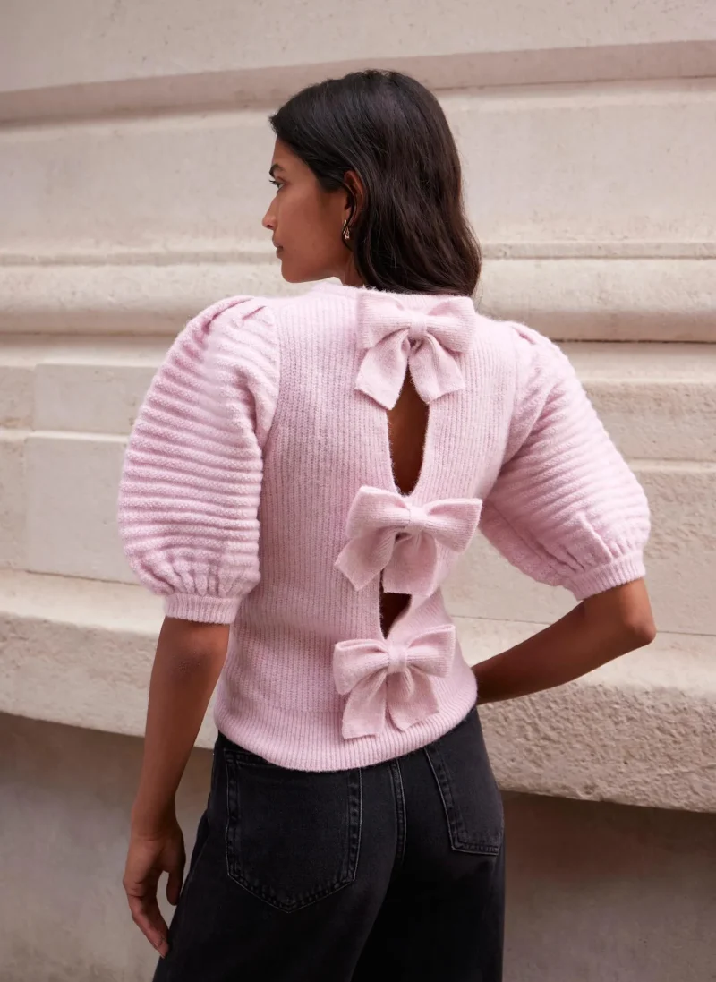 soft pink wool knit top with bow back