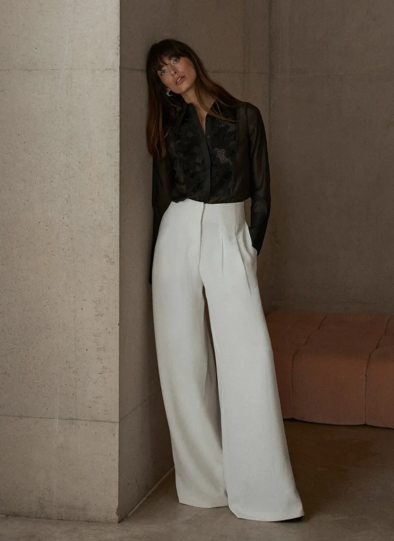 white darted wide leg trousers